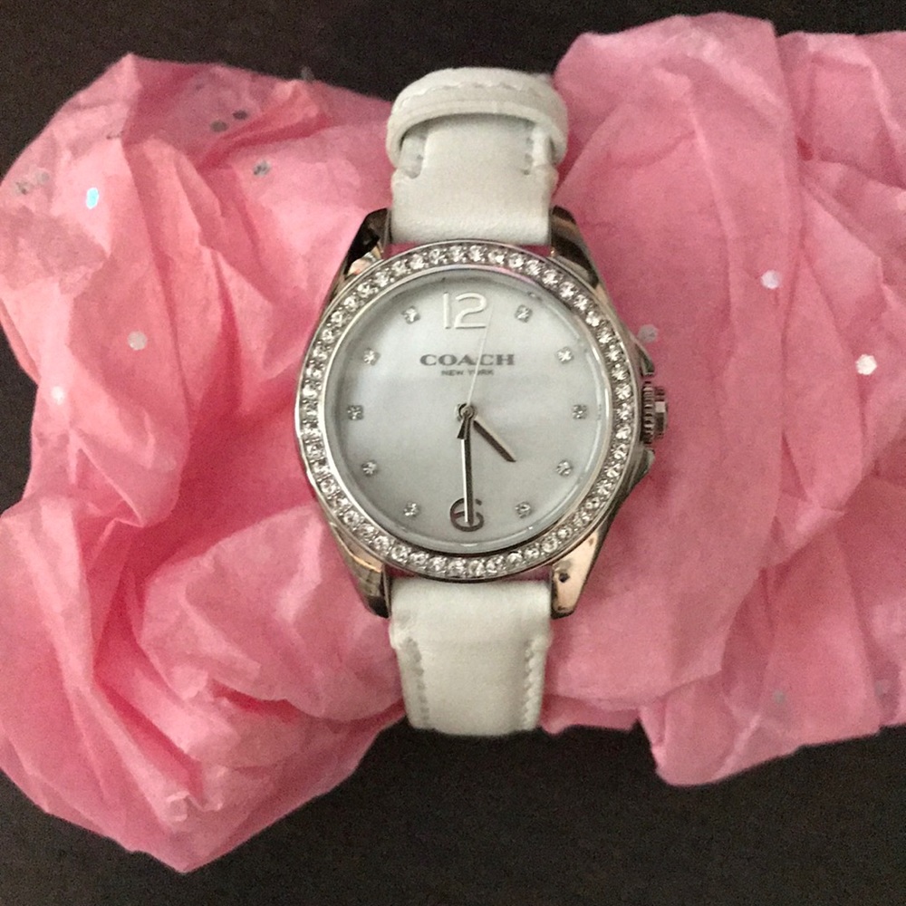 Elegant white Coach watch. Never worn.